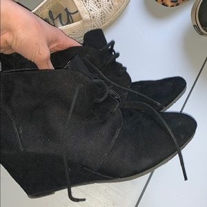 Cute black wedge booties great for winter